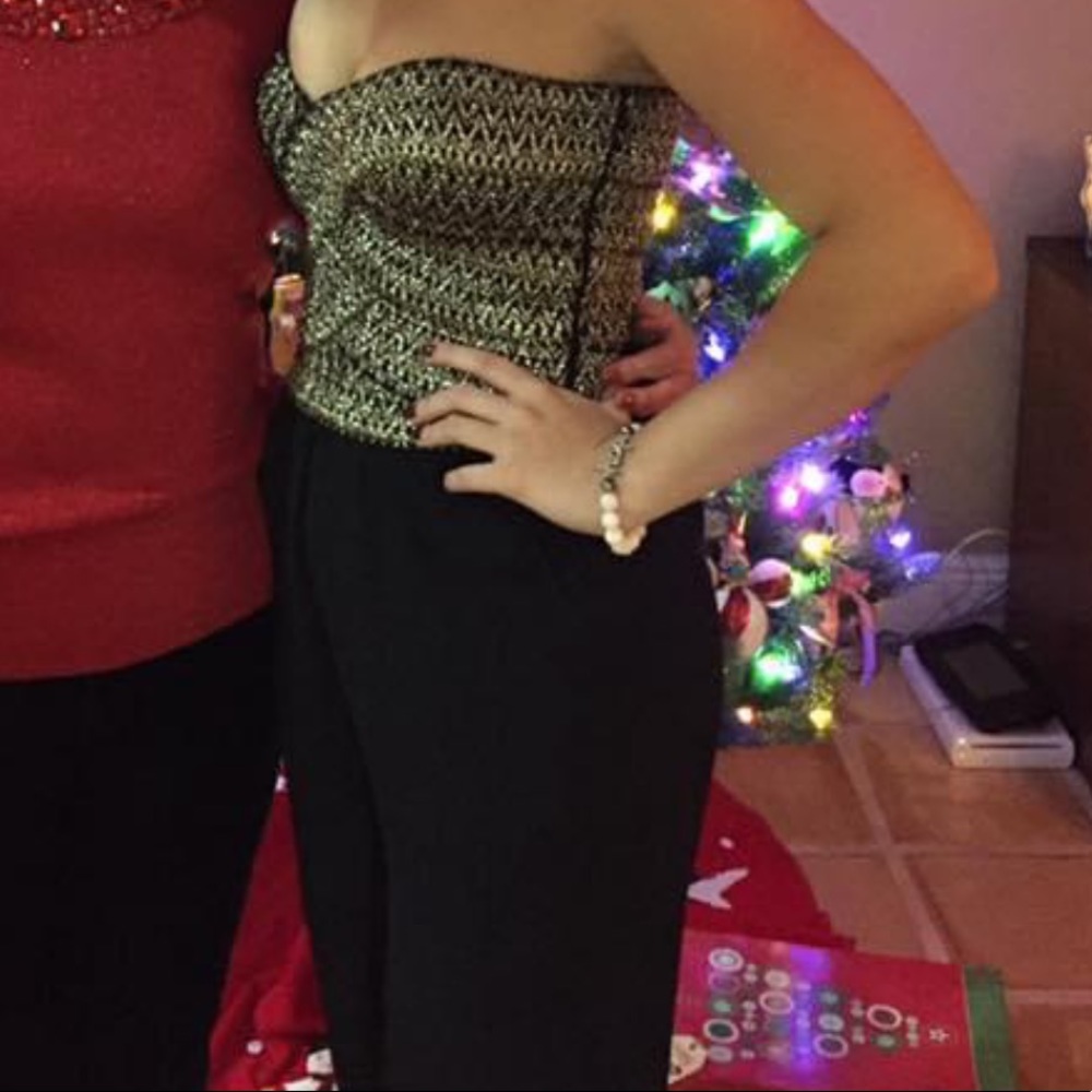 Boutique strapless jumpsuit with pockets!